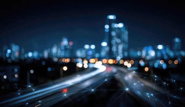 Blurred cityscape at night, illuminated by traffic lights, with network lines overlayed