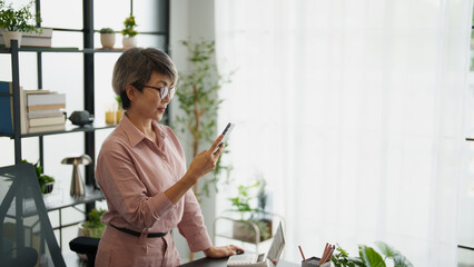 Senior business asian woman mature working in office