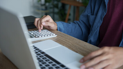 Business man accountant financial analyst and auditor working and laptop for calculating 