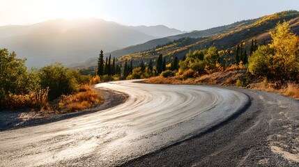 Fototapeta premium Winding mountain road at sunrise.