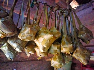 Ketupat is a traditional Indonesian food made from rice wrapped in woven coconut leaves. Often...