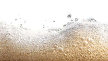 Close-up of foamy liquid, light tan/white bubbles