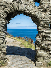 Ruins of Tintagel Castle at Tintagel, Cornwall, England, on a summer day.
