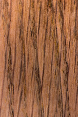 texture of wood. wooden board, eclological material. artificial wooden coating, 
from recycled materials,beautiful texture, light, brown, view from above. vertical texture.