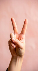 Peace Sign Hand Gesture on Textured Pink Background
