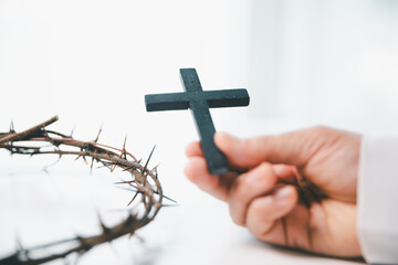 Crown of cross with hand. Crown of thorns on head and hands nailed to cross, Jesus Christ made...