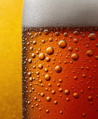 Close up of refreshing amber beer with bubbles and foam, showcasing its rich color and texture