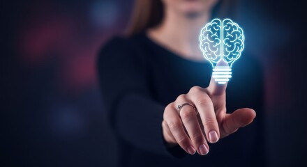 Business innovation concept showing professional hand holding glowing brain lightbulb hologram, symbolizing creative artificial intelligence, idea generation, futuristic leadership and insight