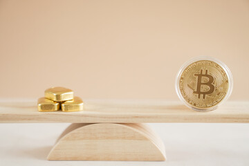 Gold bullion and bitcoin on seesaw, assets comparison for investment concept
