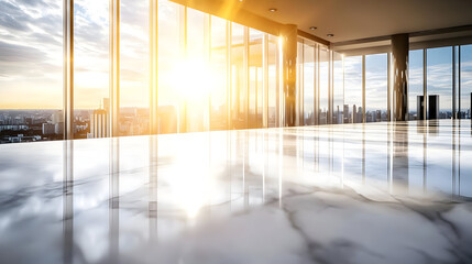 Modern, spacious office interior with large windows showcasing a city skyline at sunset. Polished marble flooring reflects the natural light