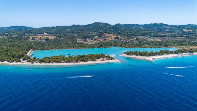 Aerial drone view of Port Glarokavos and lagoon beach in Kassandra penisula Chalkidiki Greece