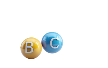 Two glossy vitamin balls, one yellow with "B" and one blue with "C