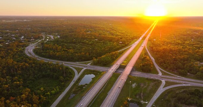 Road network of express lanes and overpasses moving fast vehicle traffic through U.S. highway system
