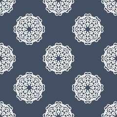 Elegant white mandala lace pattern on a dark blue background, seamless and intricate. Perfect for spiritual, decorative, or textile design.