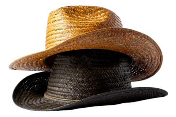 Stylish Stack of Straw Hats for Summer Sun Protection, Rustic Woven Hats in a Towering Arrangement