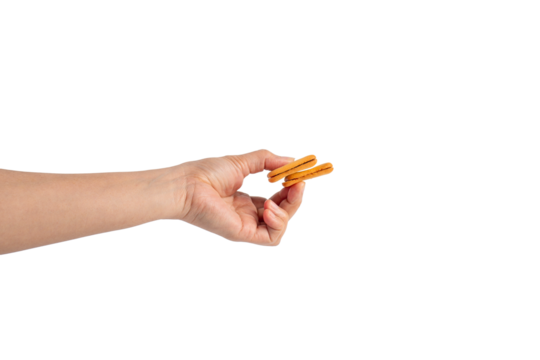 Square crispy snack in hand on transparent background