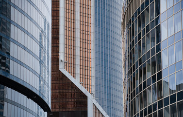 walls and empty windows of a modern building on a big city street without people