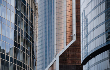 walls and empty windows of a modern building on a big city street without people