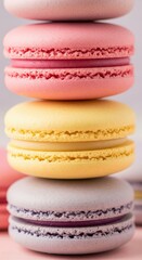 Obraz premium A delightful stack of colorful macarons, showcasing their delicate texture and sweet filling 