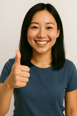 Asian beautiful woman smiling happy at the camera and give thumb up, isolated on white background