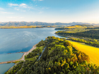 Sunset over Liptov region with Liptovska Mara lake and Tatras mountains around. Liptovsky mikulas landspace, slovakia