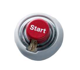 A close-up of a round, white button with a red center.  The word "Start" is printed in bold, white letters on the red disk.  A small, metallic key is visible inside the white ring