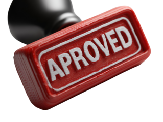 Close-up of a red rubber stamp with the word "APPROVED" in white lettering. The stamp is angled, and a black handle is visible