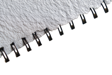 Ripped white paper with metal binding