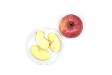 Apples in a white plate, ready to eat.
