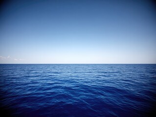 Fototapeta premium Calm ocean, blue sky, horizon, vastness, serenity, peaceful, travel, background, wallpaper