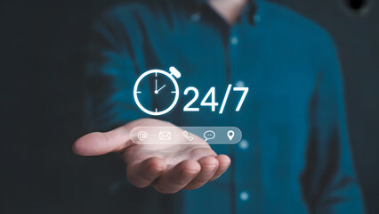 A person holding a twenty four seven service icon in their open hand space