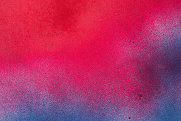 赤色と青色のスプレー塗料で塗った背景
