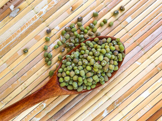 fresh green beans in a spoon