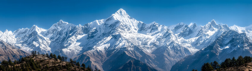 majestic himalayan mountain range with snow capped peaks and clear blue sky - scenic landscape graphy of the himalayas © john