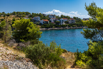 Mediterranean vegetation, road leading to Tatinje beach in Croatia, Ciovo island,