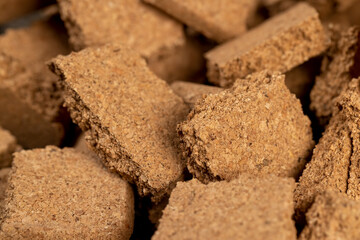 a natural material that is obtained from the bark of a cork tree