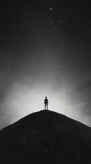 Silhouette of person standing on top of mountain under starry sky, evoking sense of wonder and exploration. contrast between light and dark enhances emotional impact