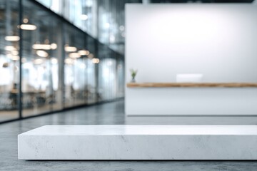 Modern office reception area with a clean, minimalist marble display platform