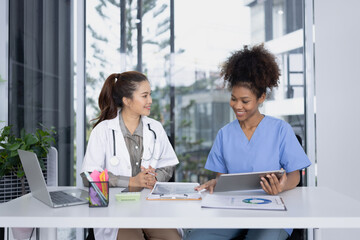 female doctor working  together clipboard in hospital, healthcare and medicine concept.
