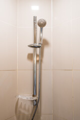 Modern shower head in bathroom. Simple stylish and modexarn home interior design.
