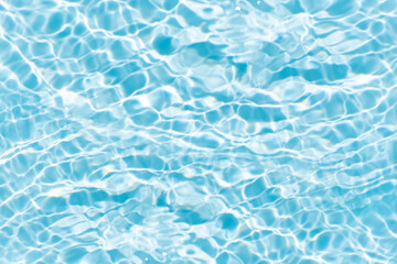 Blue water with ripples on the surface. Defocus blurred transparent blue colored clear calm water...