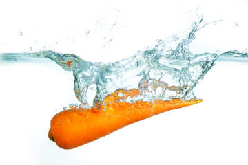 Fresh Carrot Splashing in Clean Water Against White Background
