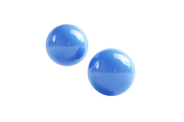 Fototapeta premium Two glossy, light-blue spheres against a black background. They appear to be floating, smooth and reflective, slightly offset from each other