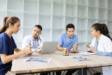 Medical team brainstorming having a meeting in conference room at hospital, Medical technology and...