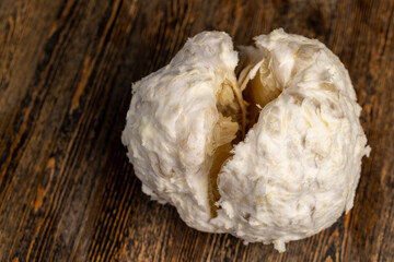 pieces of delicious and sweet citrus fruit while preparing it for eating, closeup