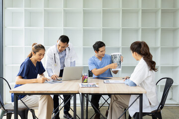 Medical team brainstorming having a meeting in conference room at hospital, Medical technology and health care concept.