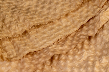 paper made of waste paper for storing equipment and objects, paper details with a raised surface and a large number of irregularities