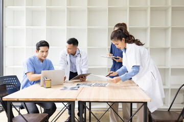Medical team brainstorming having a meeting in conference room at hospital, Medical technology and health care concept.