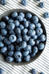 Raw Organic Blueberries in a Bowl, top view. Overhead, from above.