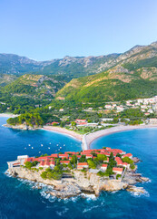 Old town and beach Sveti Stefan sea island, Budva, Montenegro, Europe